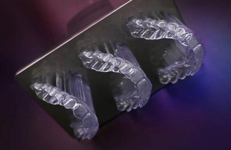 Three Keysplint Clear Night Guards hanging